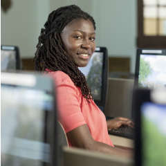 Female Student using computer lab