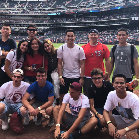 International students participating in Fordham's Global Transition program attend a Mets game.