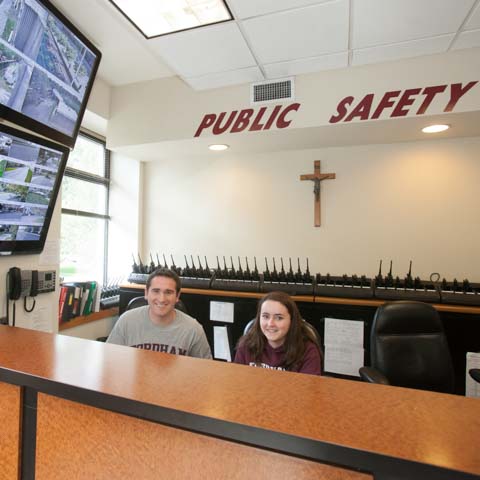 Two students at public safety desk - LG