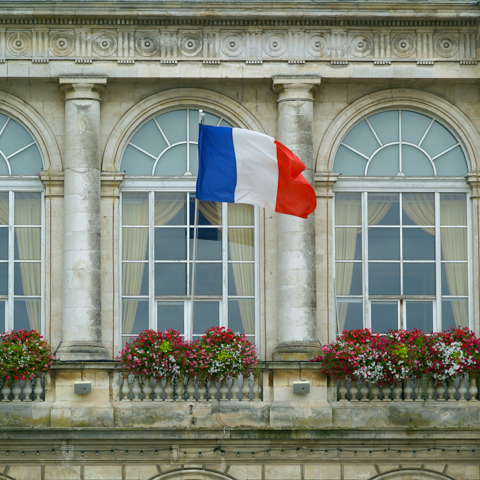 French flag in front of building - LG