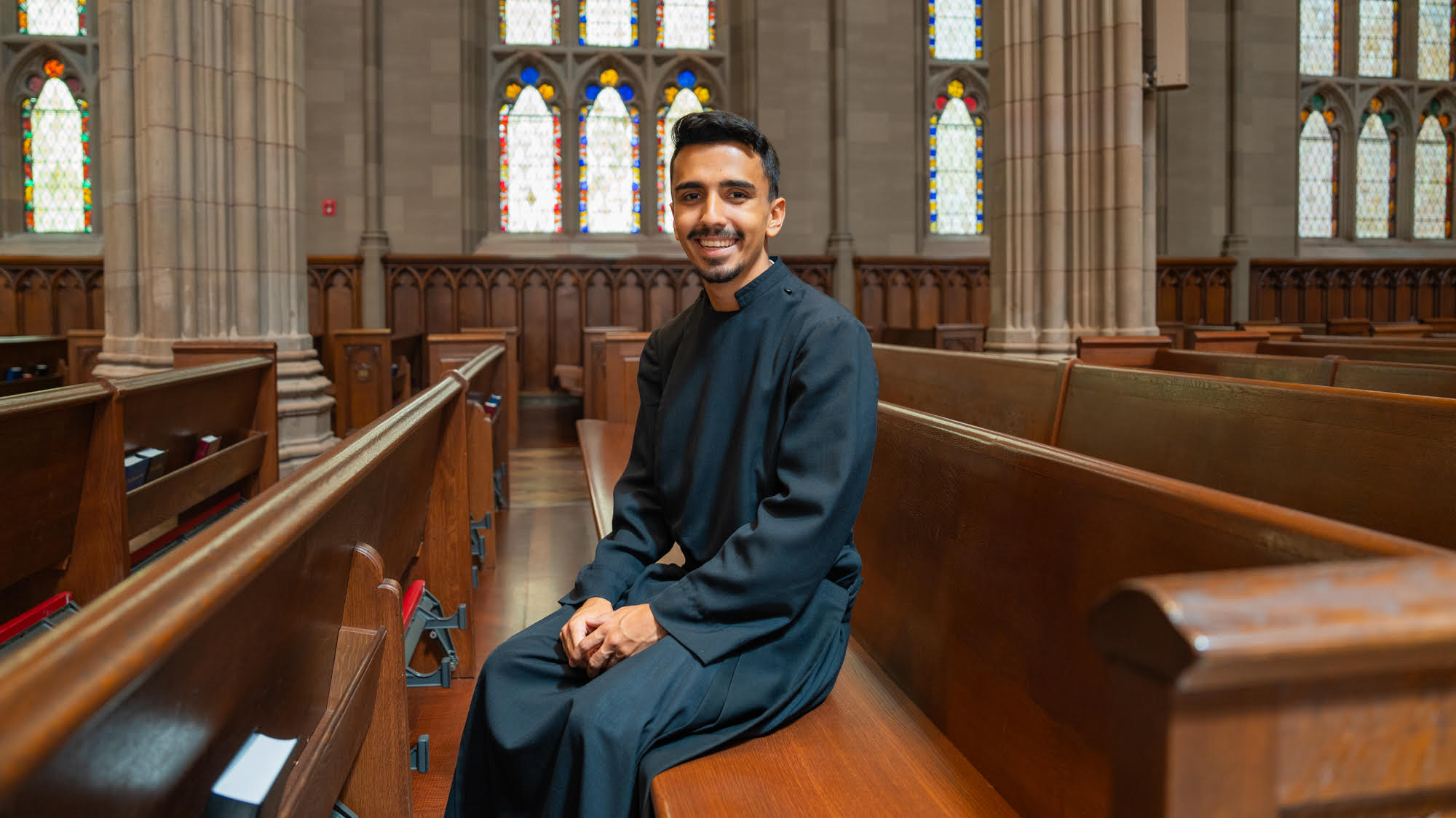 John Garza in a pew at Trinity Church