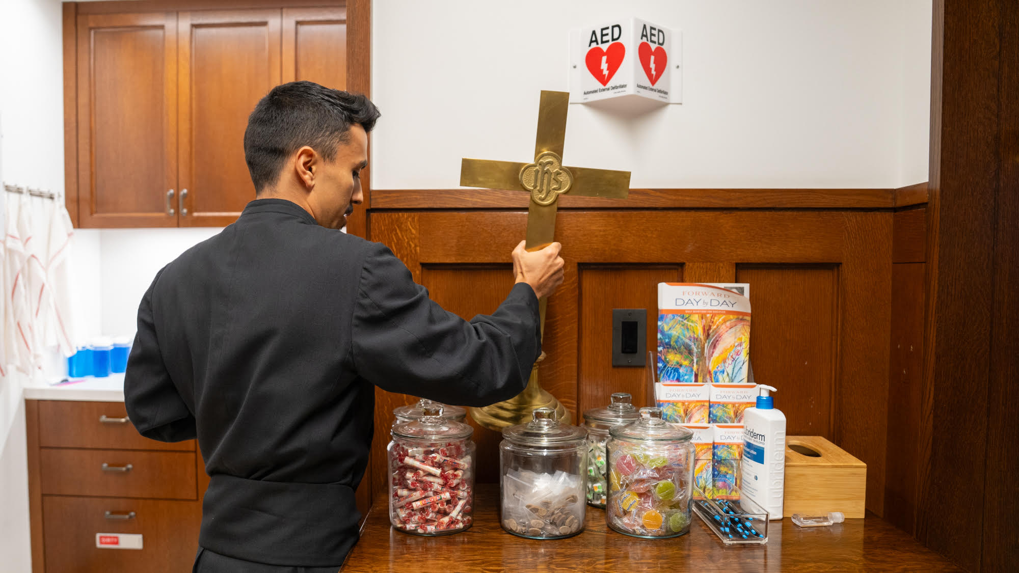 John Garza organizes after service at Trinity Church