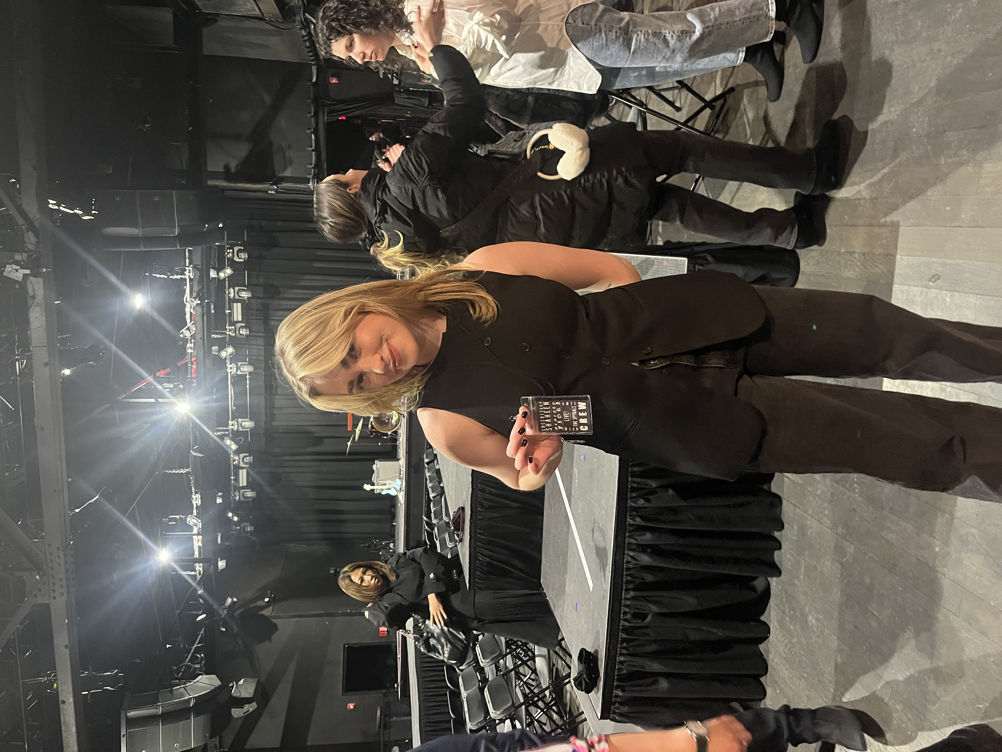Molly Chamberlain poses at a live event for Brunello Cucinelli