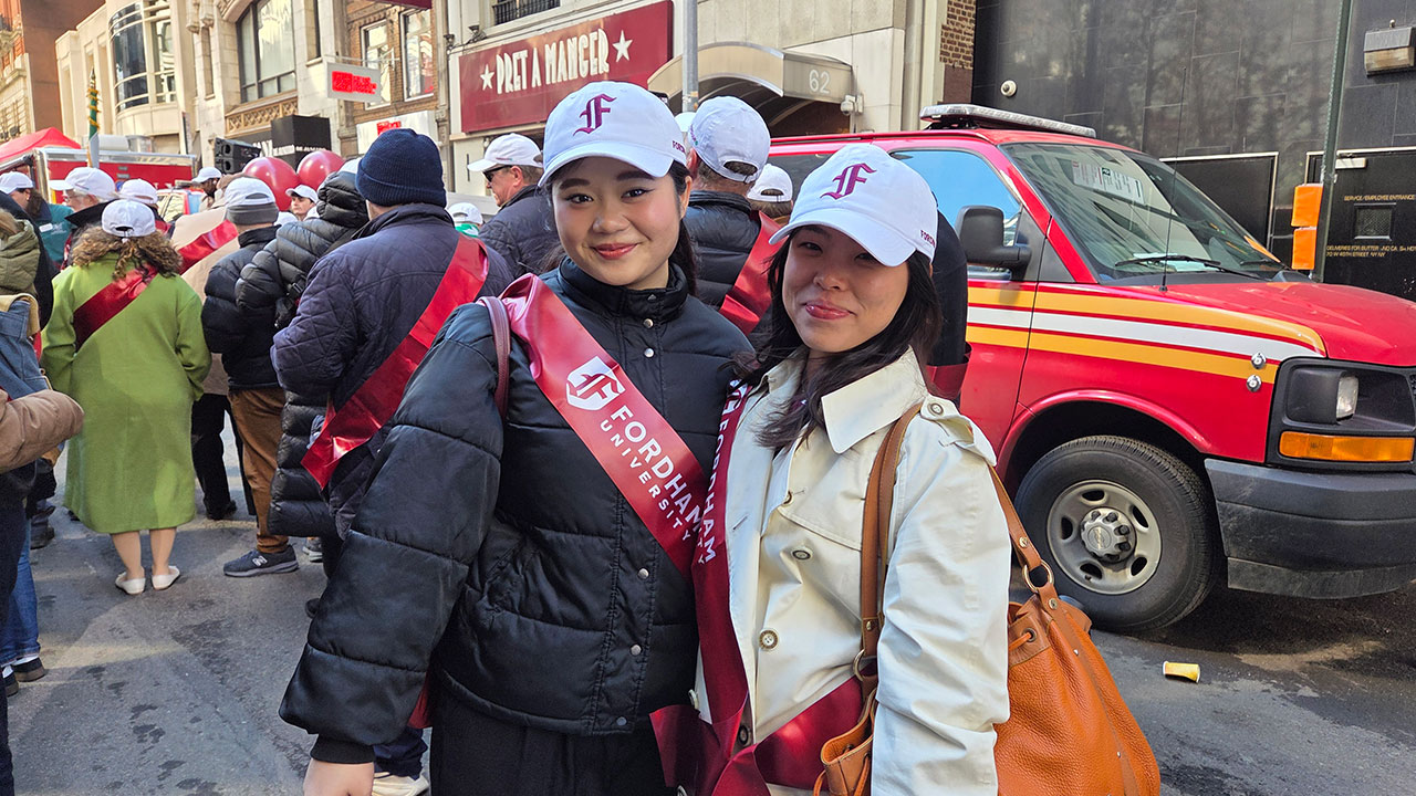Linh Hoang and Risa Iawazak pose at St. Patrick's Day Parade