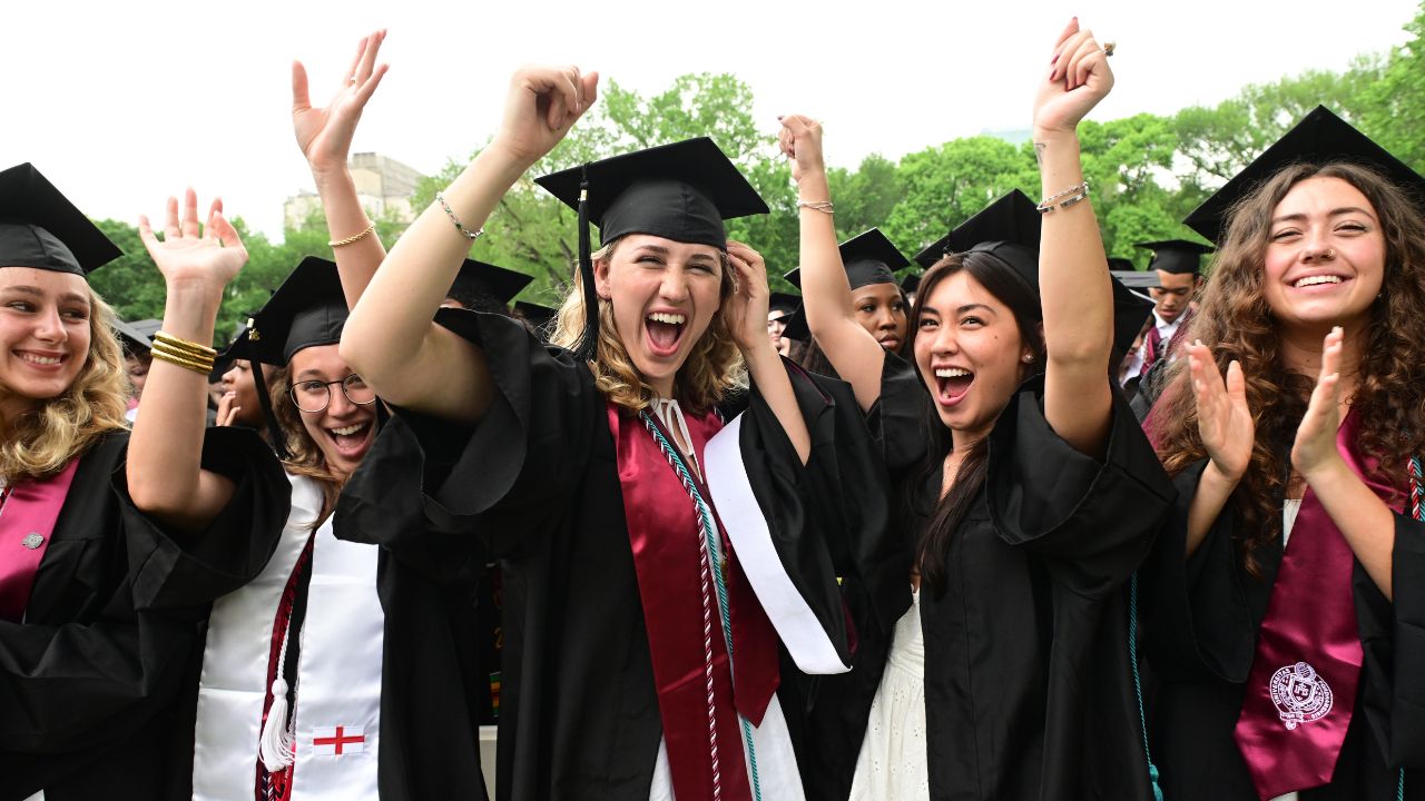 Graduates celebrating at Commencement