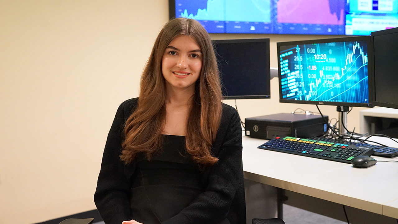 A student sits in the trading room