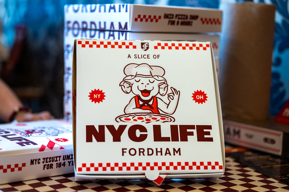 Fordham's Pizza Shop pizza boxes featuring Ramses in a chef's hat