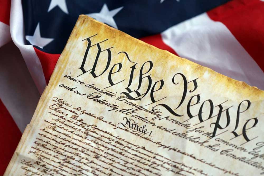 Stock image of the Constitution showing We the People