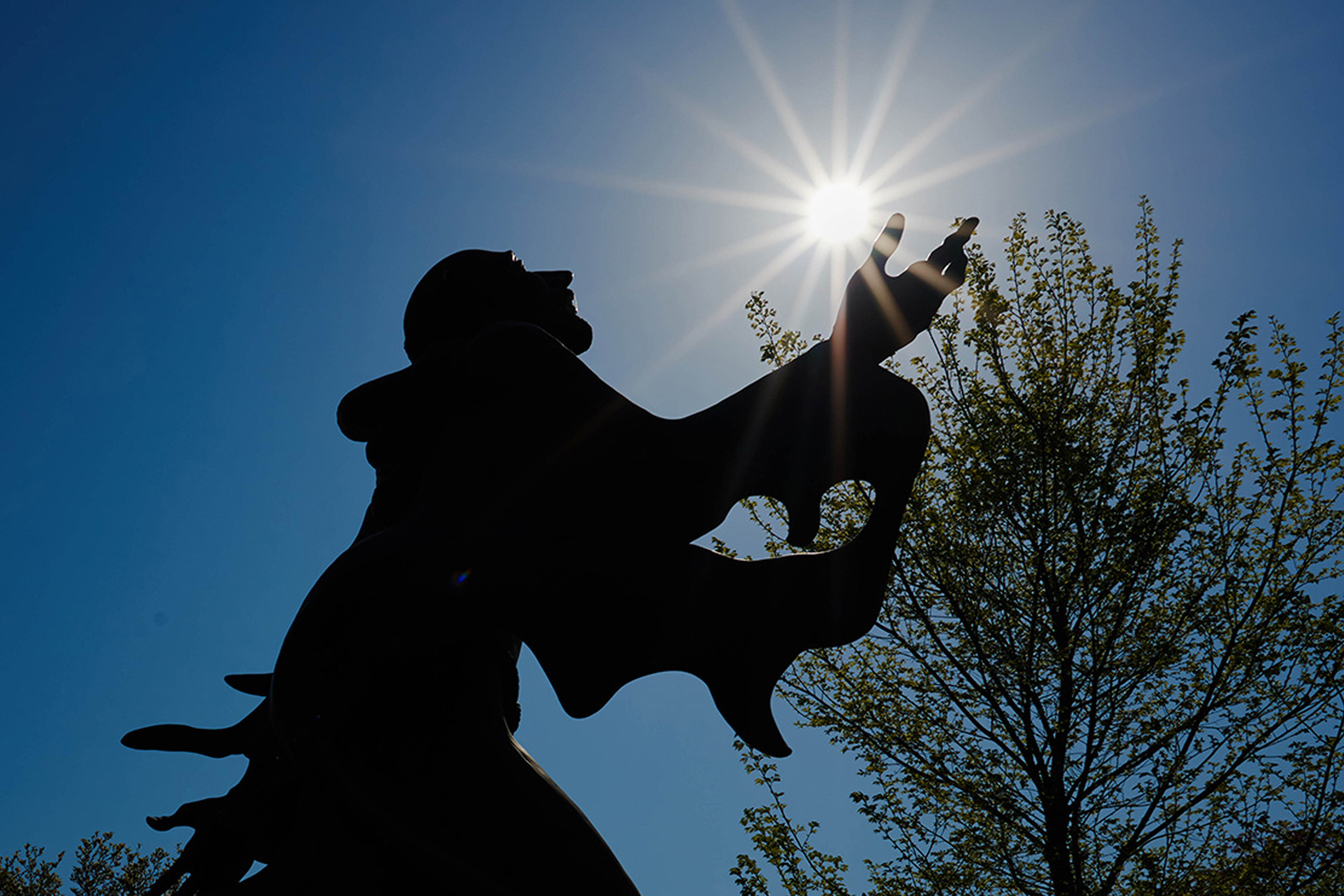 Ignatius statue at sunset at Rose Hill