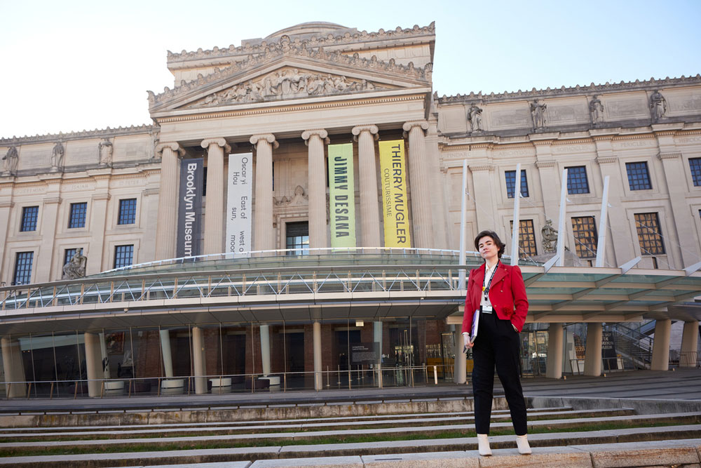 Caridad Kinsella stands outside the Brooklyn Museum where she worked as an intern