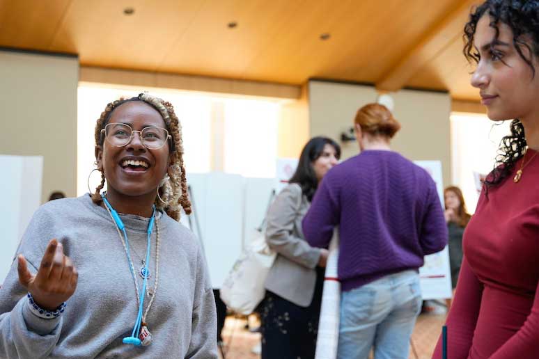 A student attends the research fair