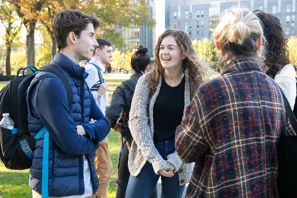 Students in jackets outside on Rose Hill Campus