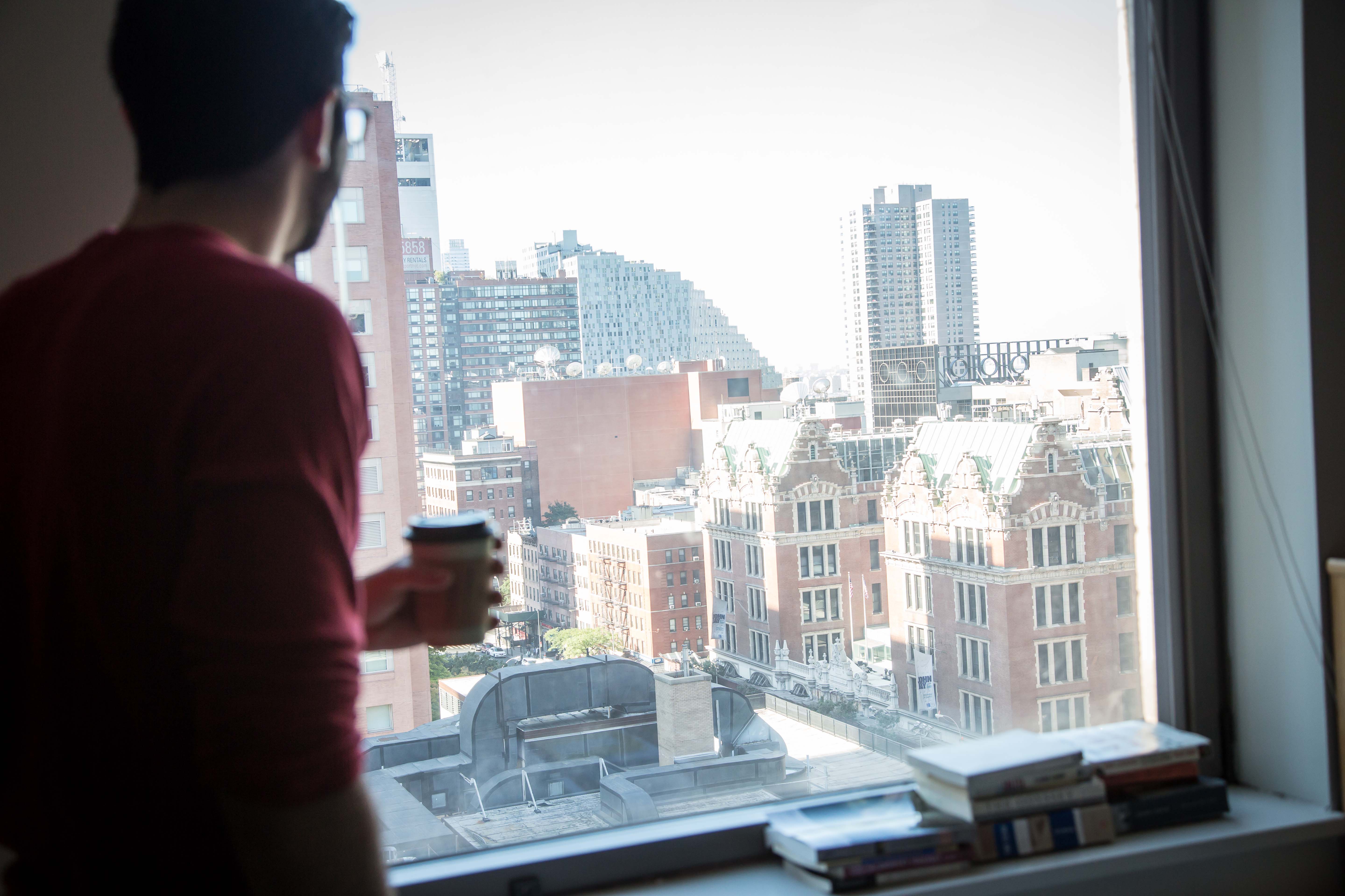 Student looking out window in McMahon hall