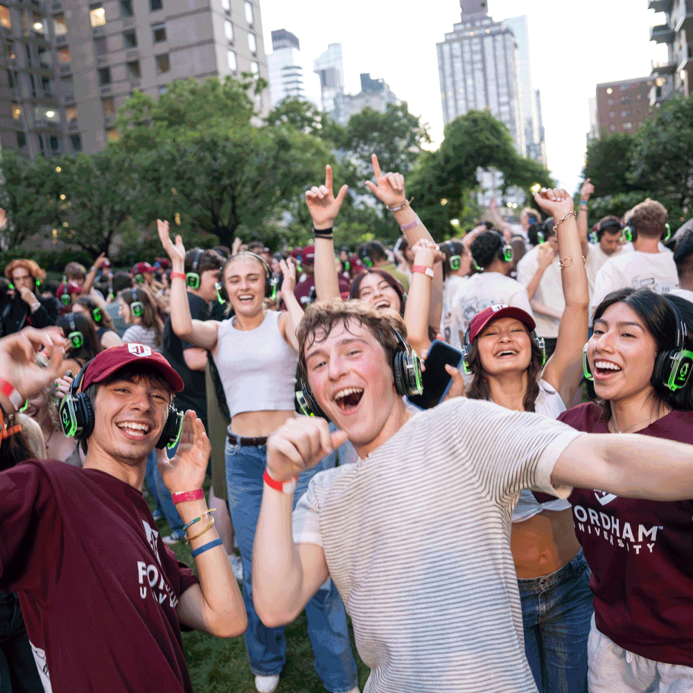 First-year students dance at a silent disco on the Lincoln Center campus as part of new student orientation