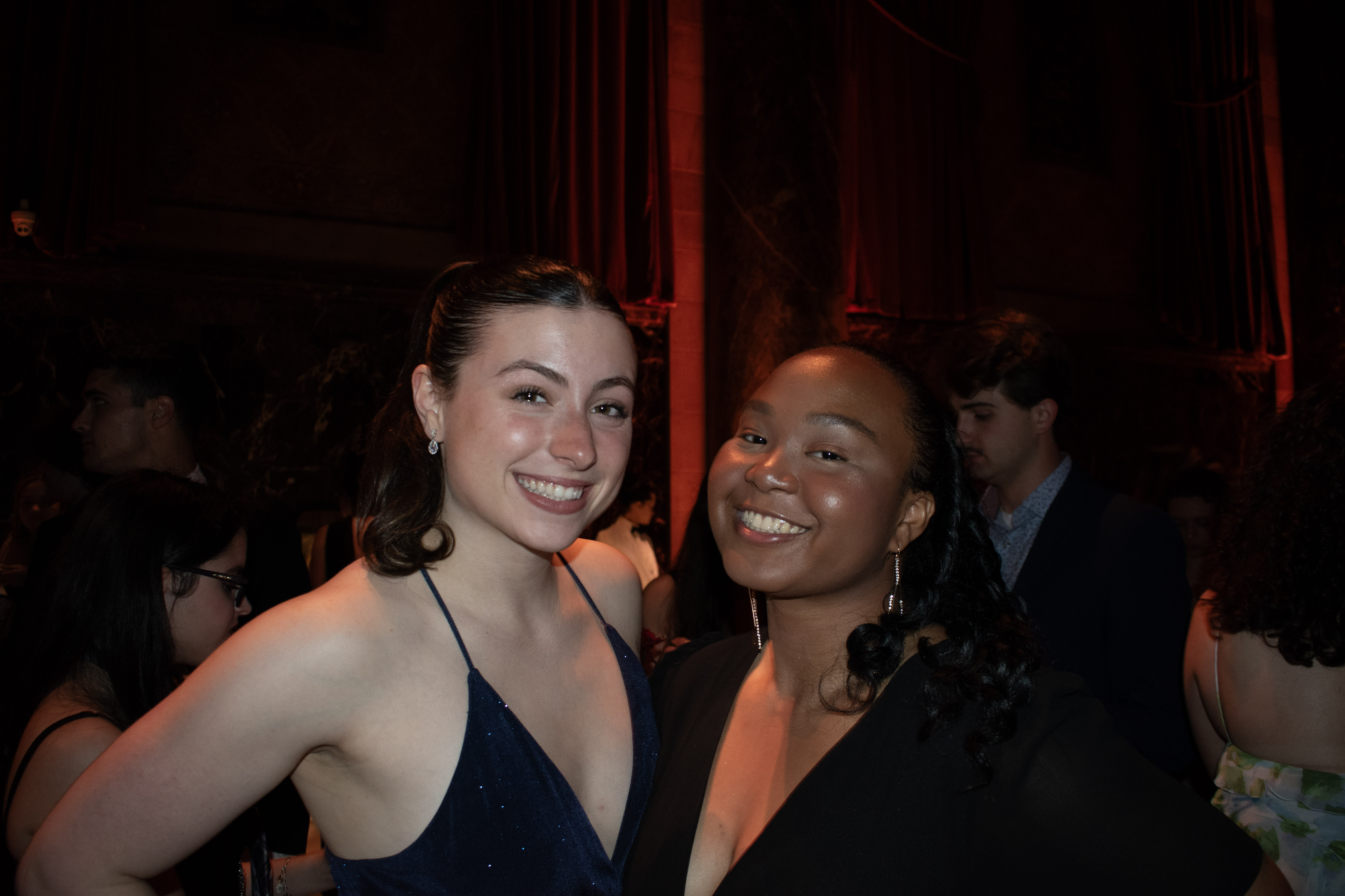 Two female students attending the senior ball