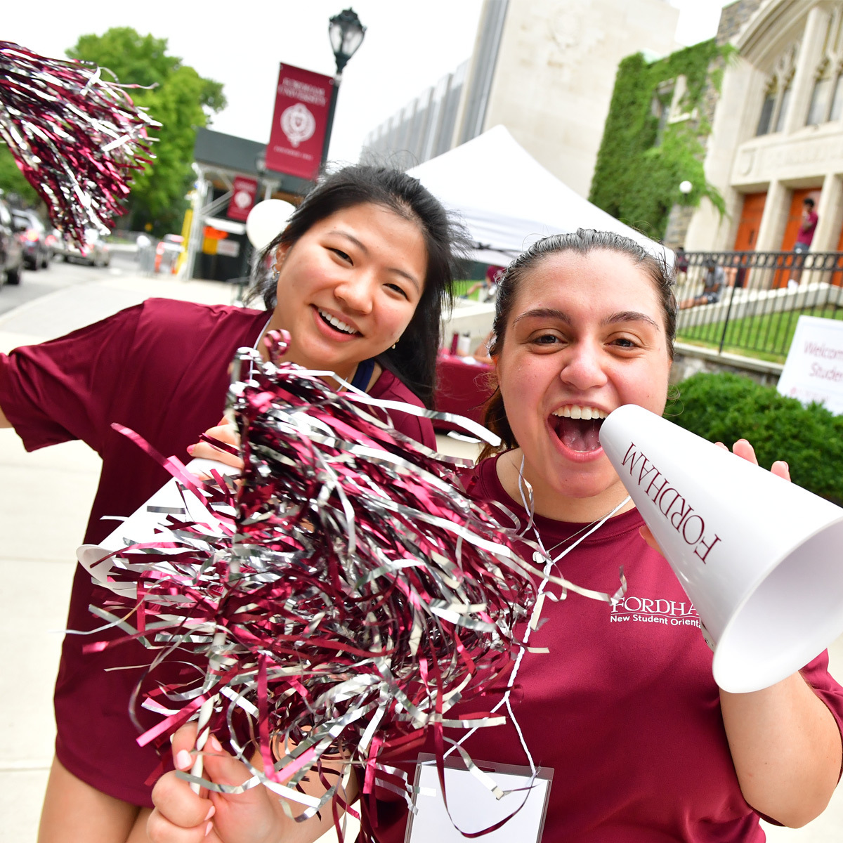 Two students cheering at New Student Orientation at Rose Hill