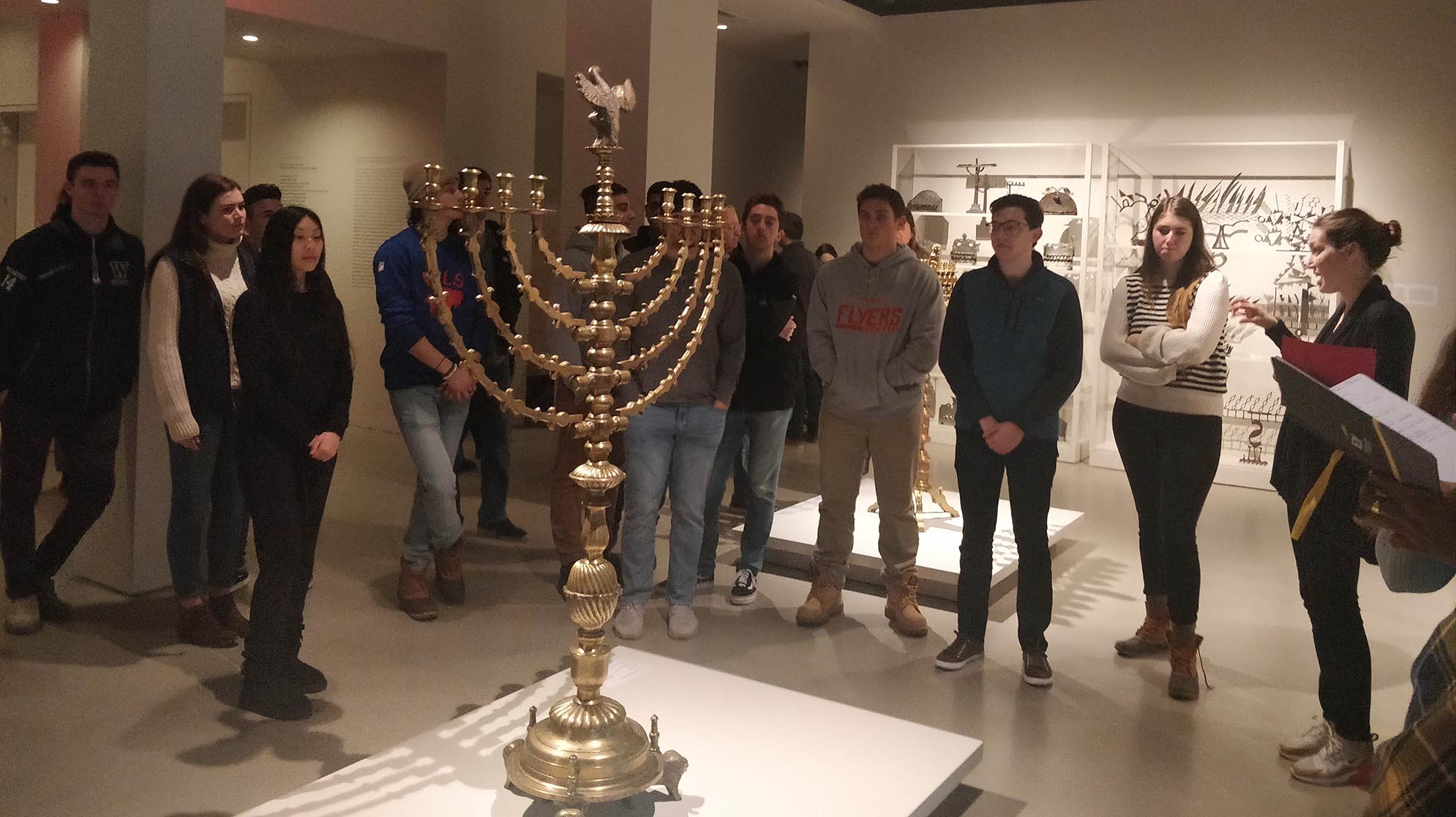 Group of students looking at art history