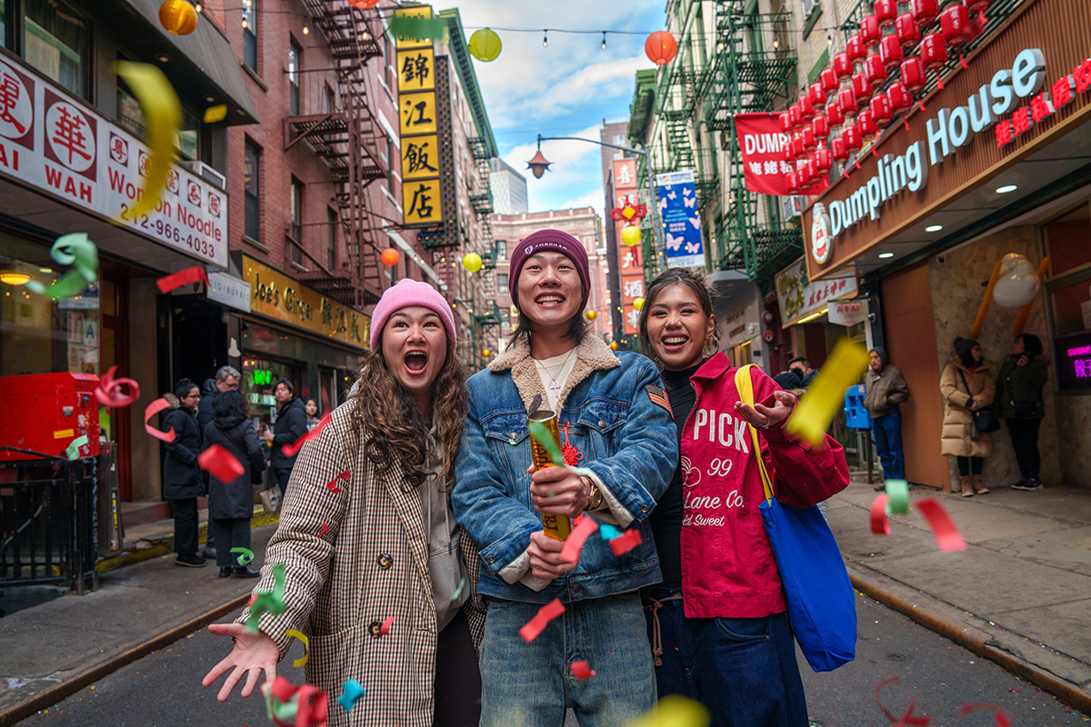 Three Fordham students take in the Lunar New Year festivities in Chinatown in NYC