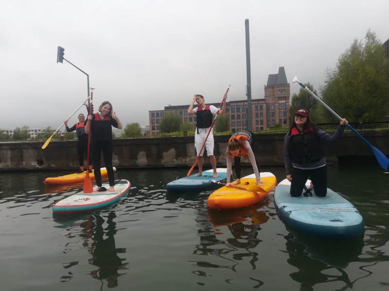 Students kayaking on the water
