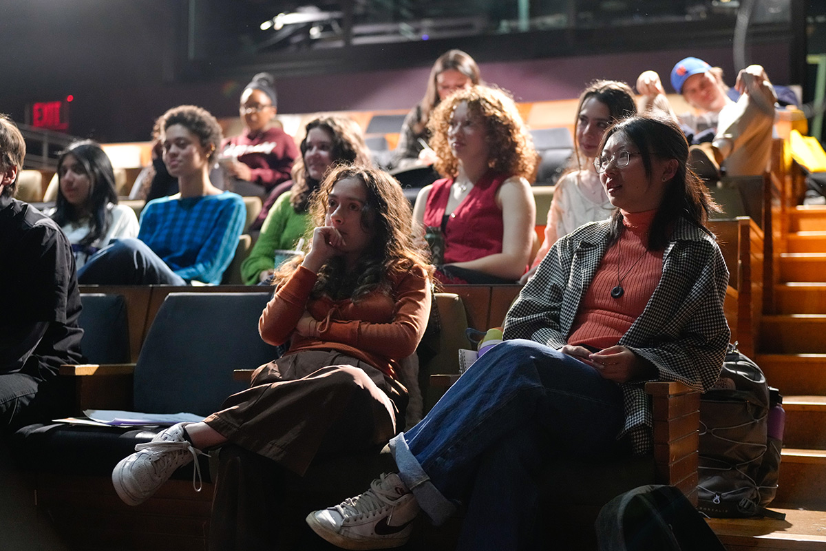 Students sitting in an auditorium for a lecture