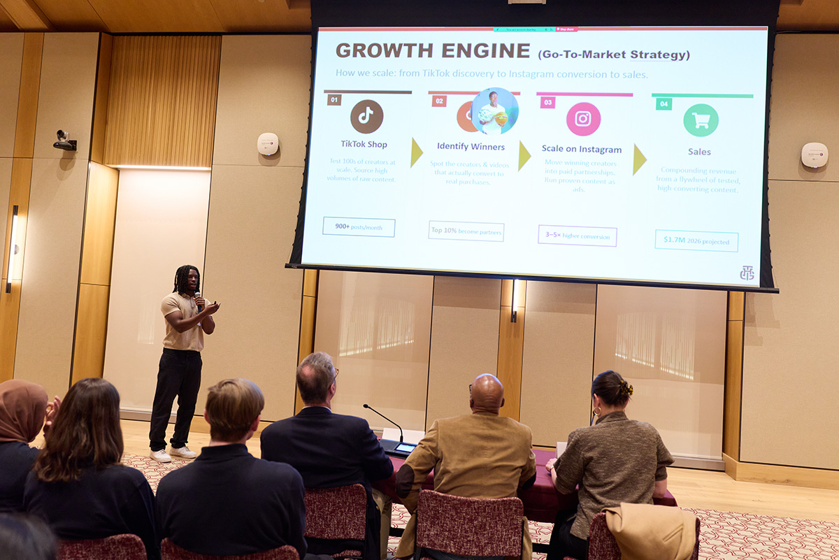Male student presents his business plan at a Fordham Foundry event
