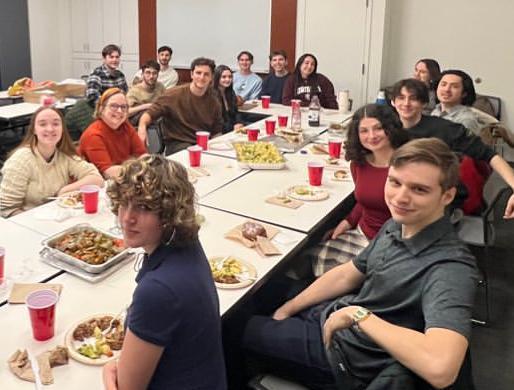 Students having dinner together 