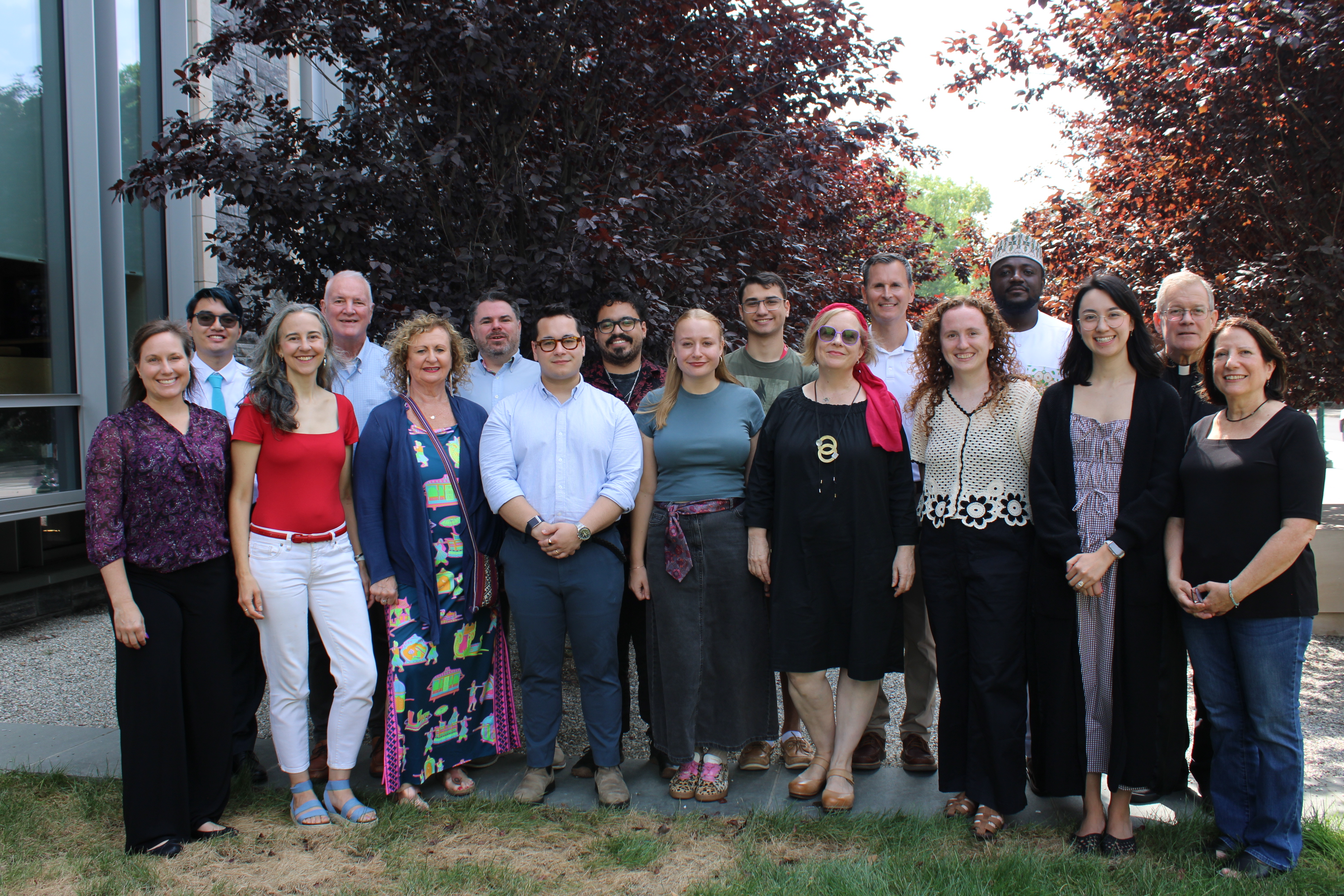 Campus Ministry Staff photo outside McShane Center.