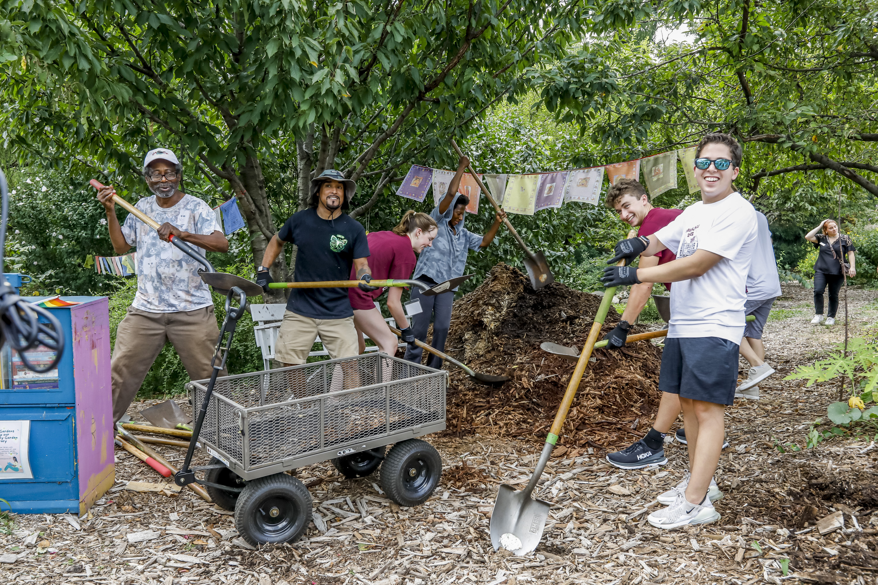 CCEL students and staff working in a community garden