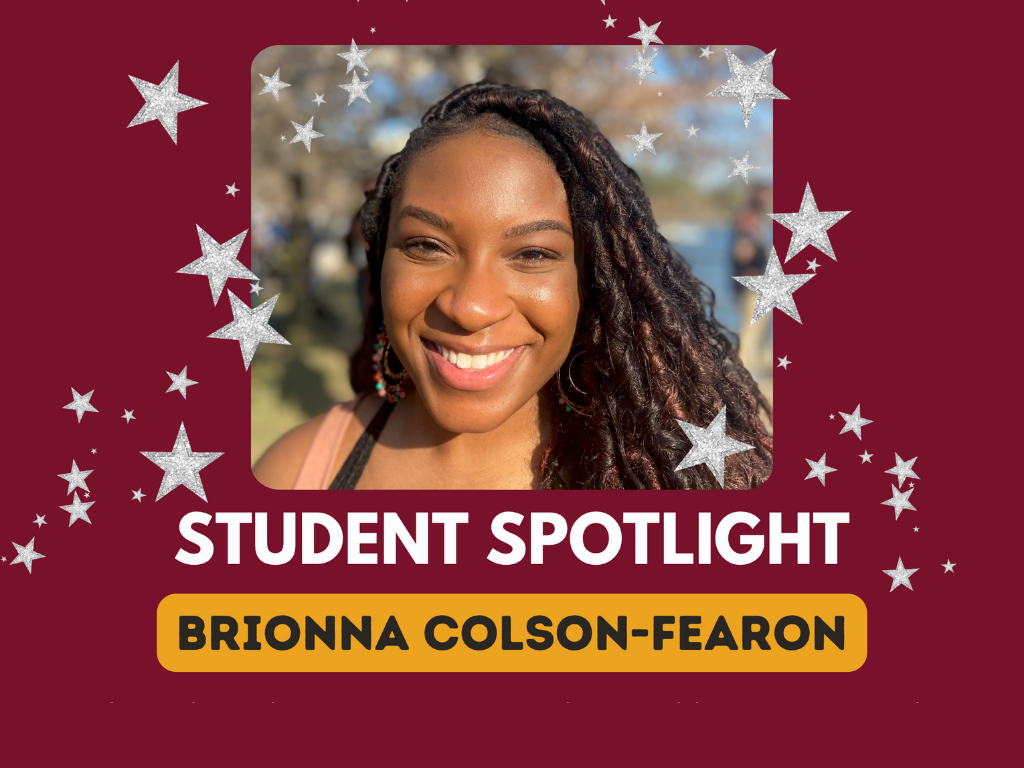 Smiling person with long hair featured in a student spotlight image, set against a maroon background with silver stars. Text reads 