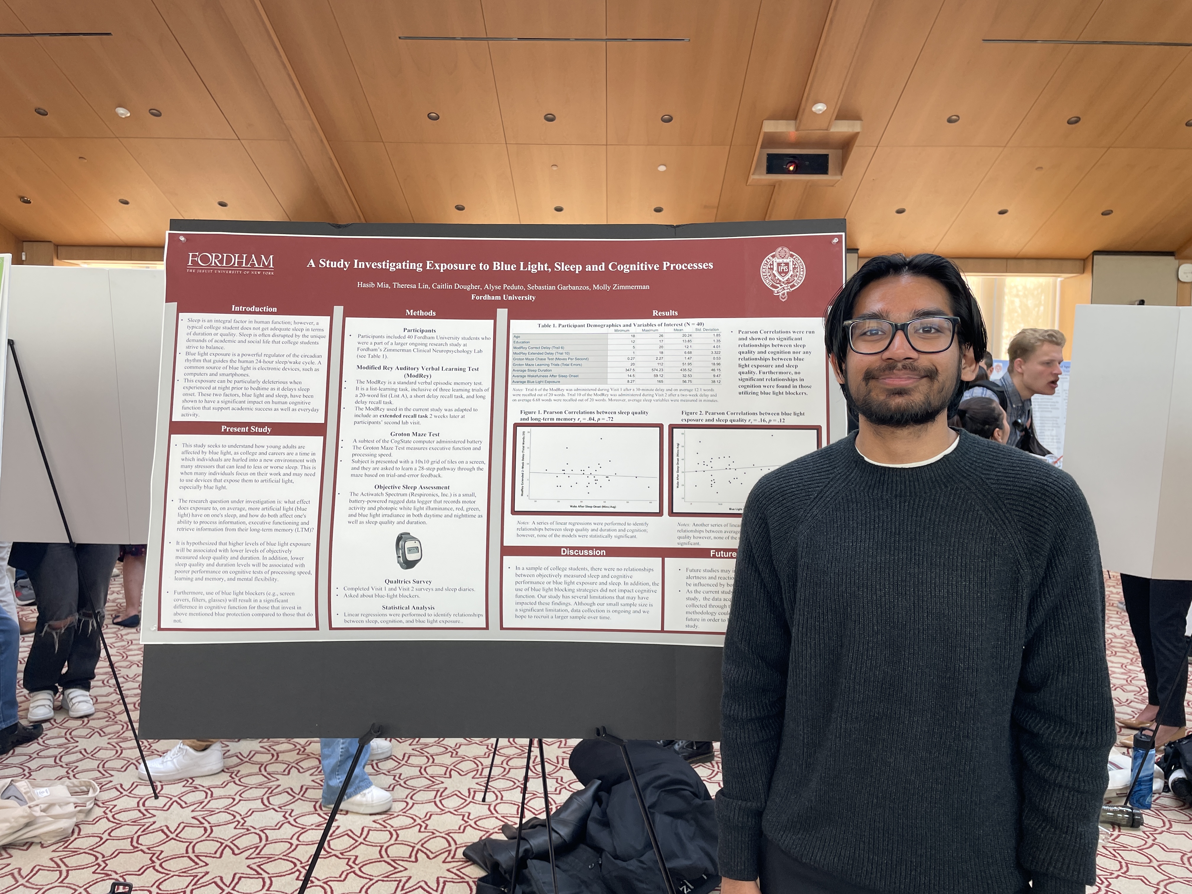 Student in front of poster presentation