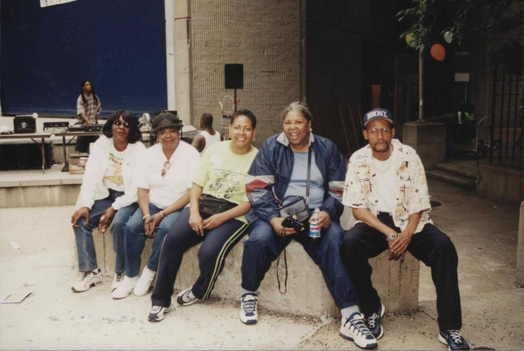 Group of residents resting together during the 2001 Family Day at the Additions
