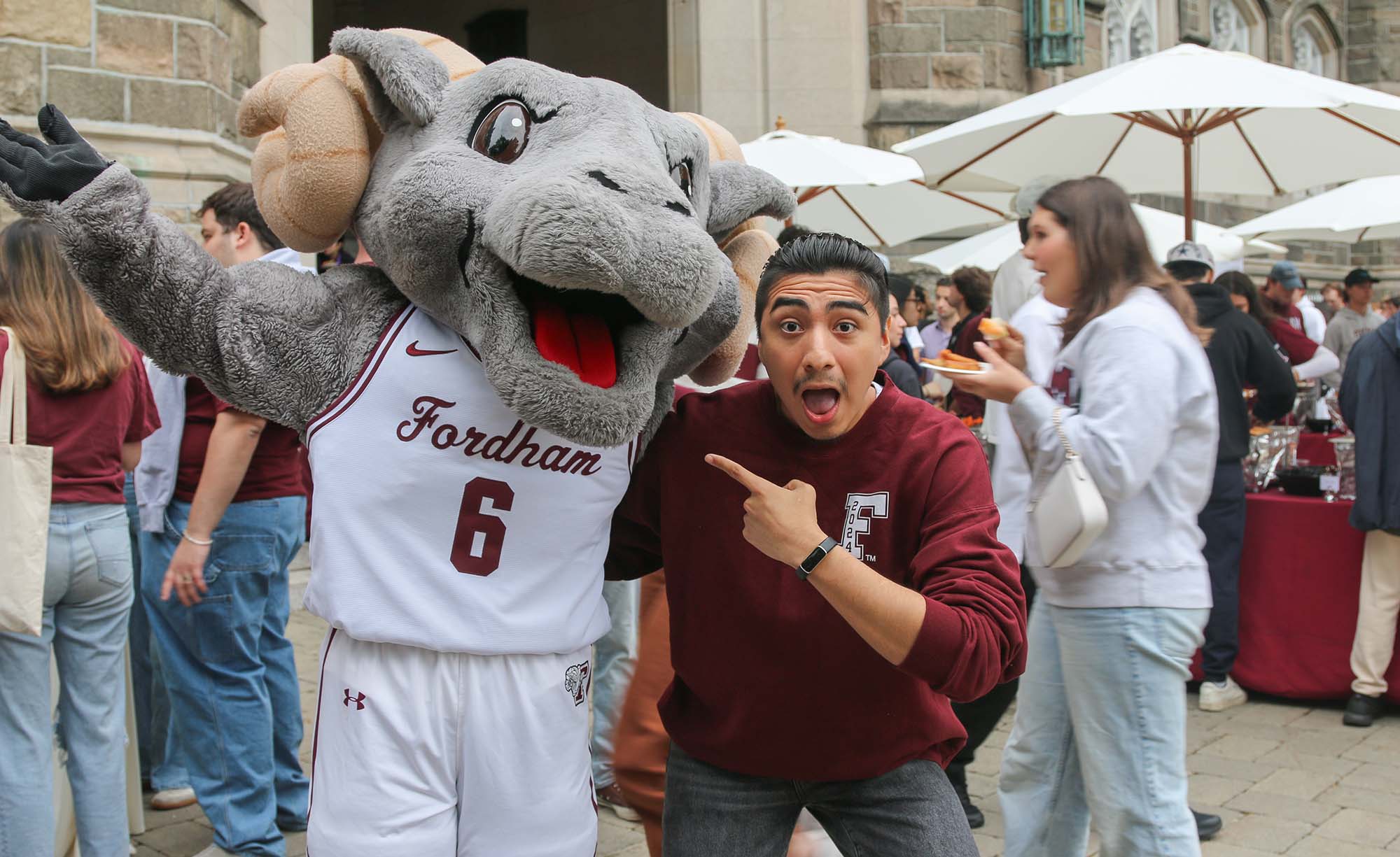 Student with the Ram at BBQ