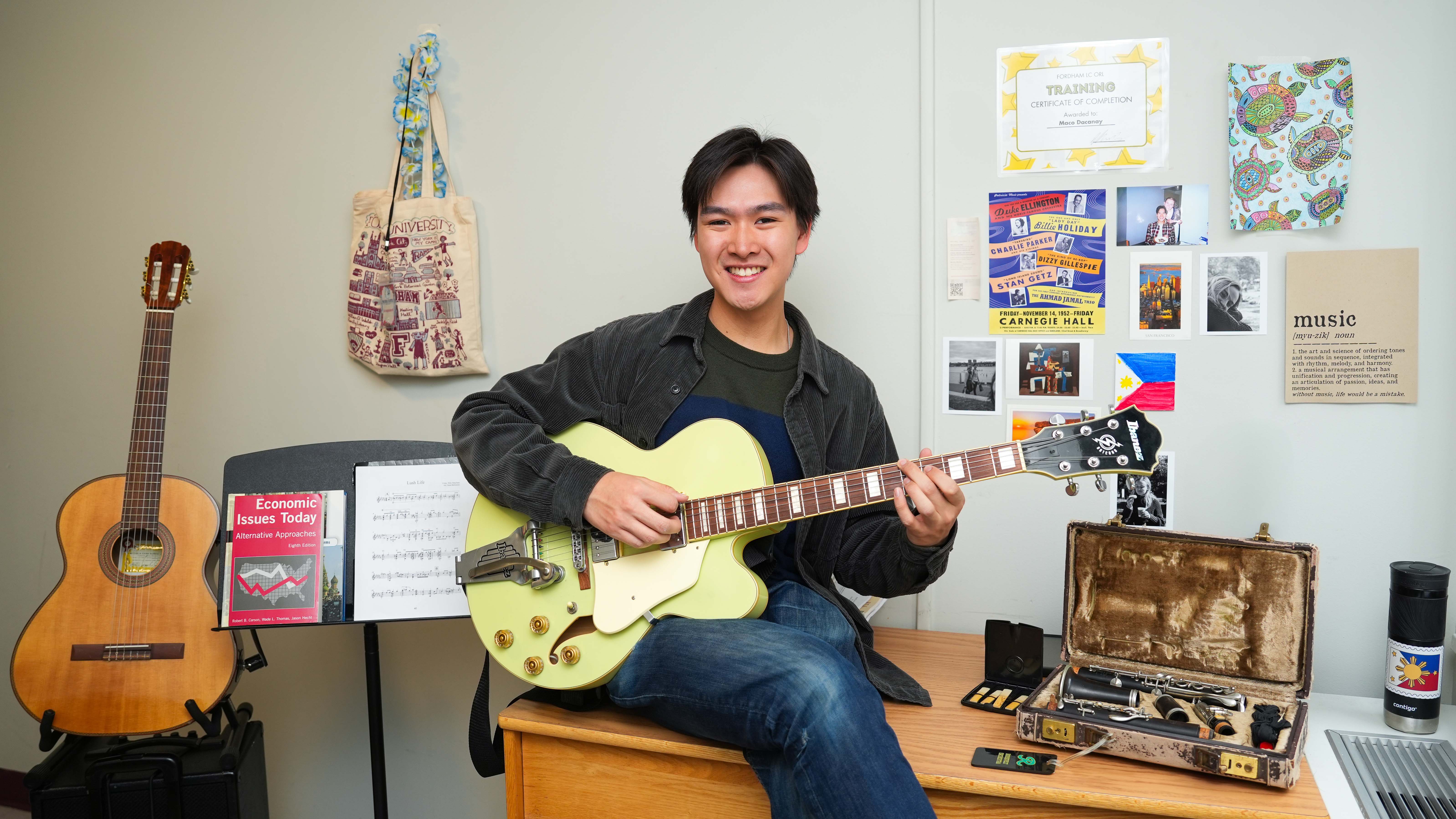 Student with guitar in McMahonHall