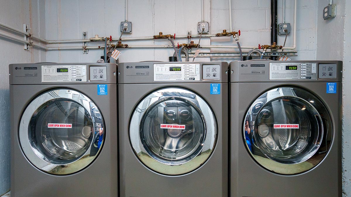 Coin laundry machines in Hughes House