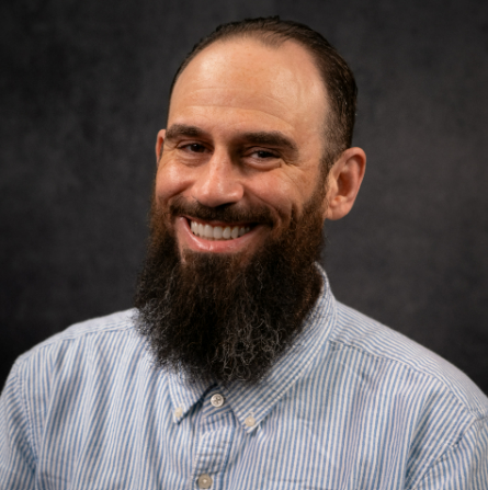 Bill Kelvin Headshot against dark plain background