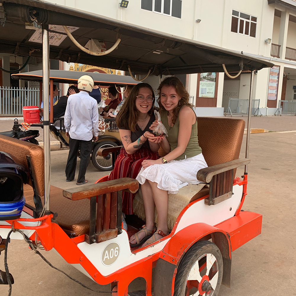 Students on a tuk-tuk in Cambodia