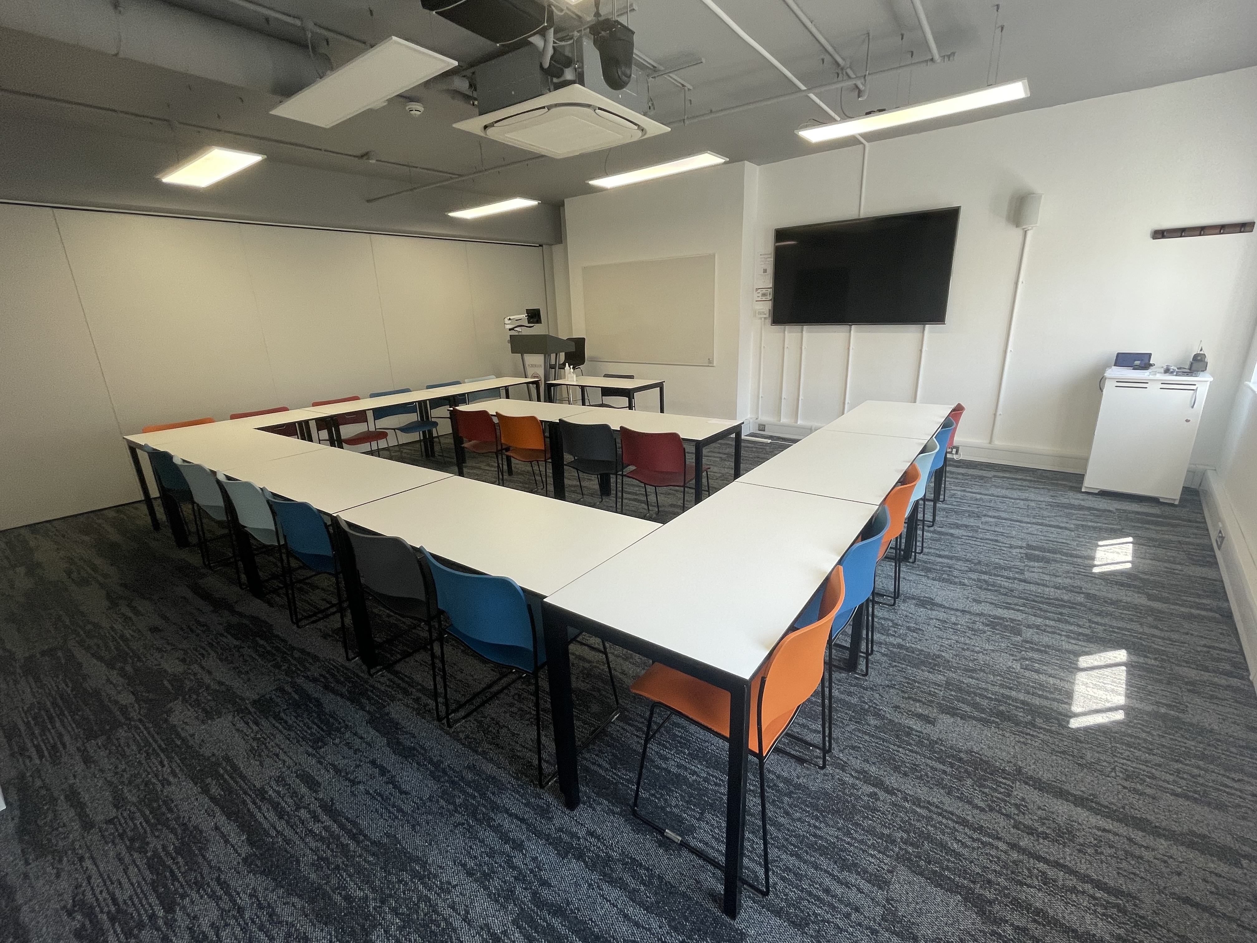 Room 302 - tables arranged as a cube with an table inset in a classroom