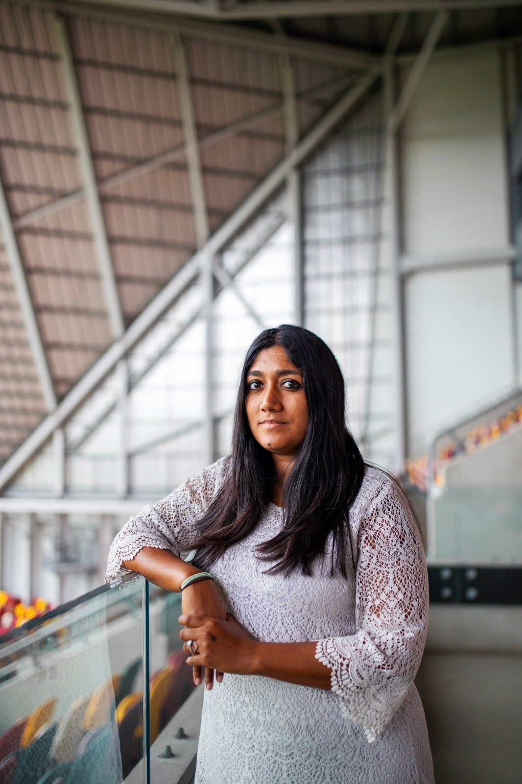Preeti Shetty with stadium seating in background