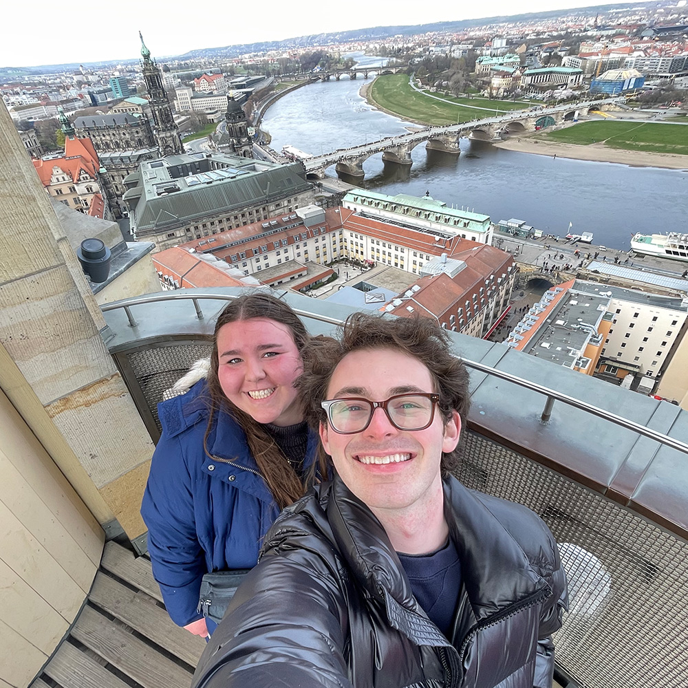 Students take a selfie overlooking city