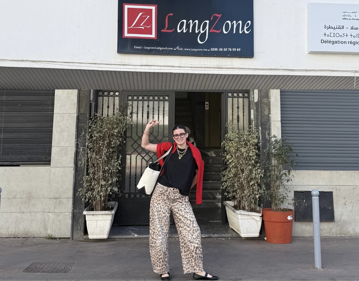 Student standing on stairs