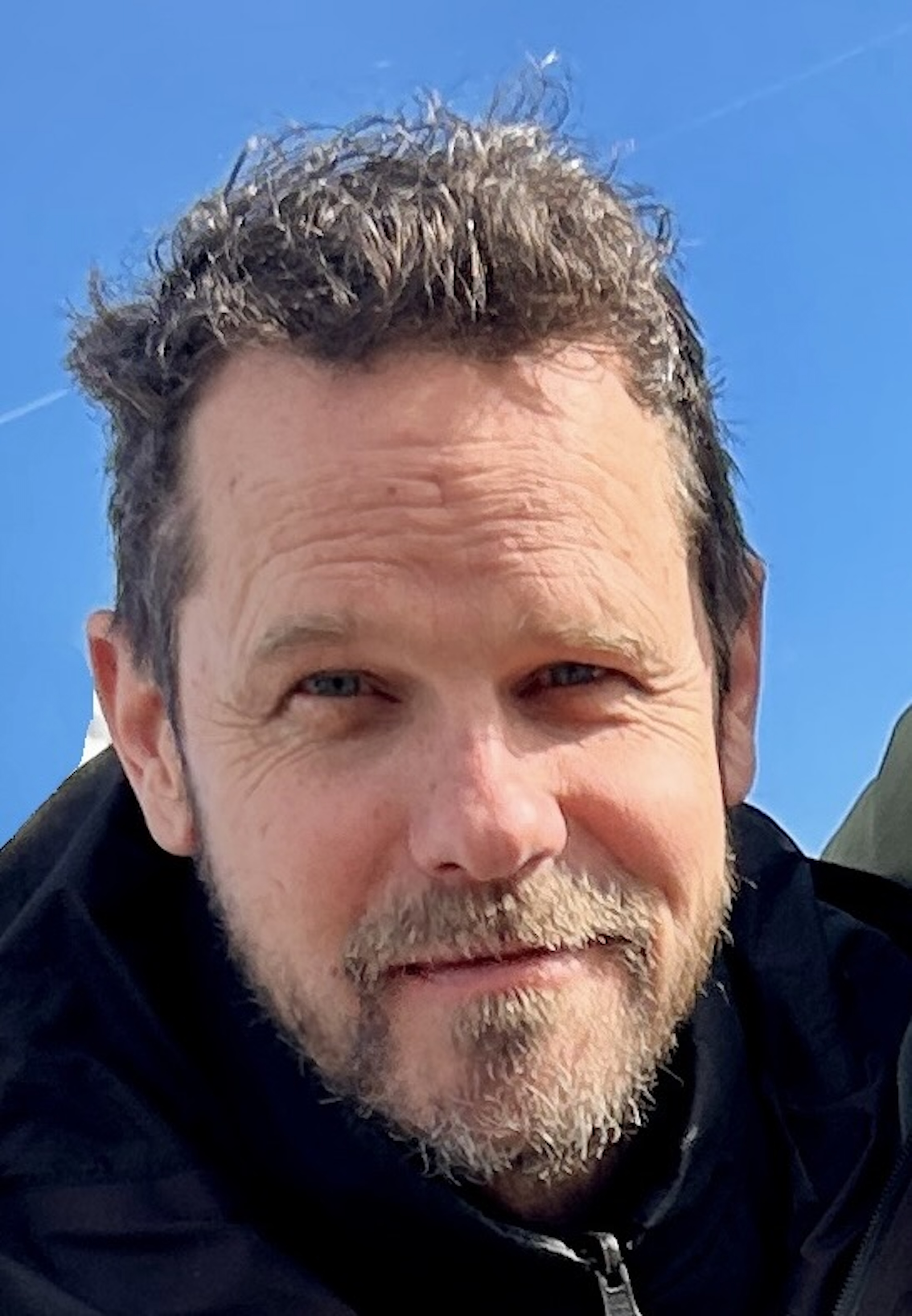 A photo of John Seitz head-on smiling