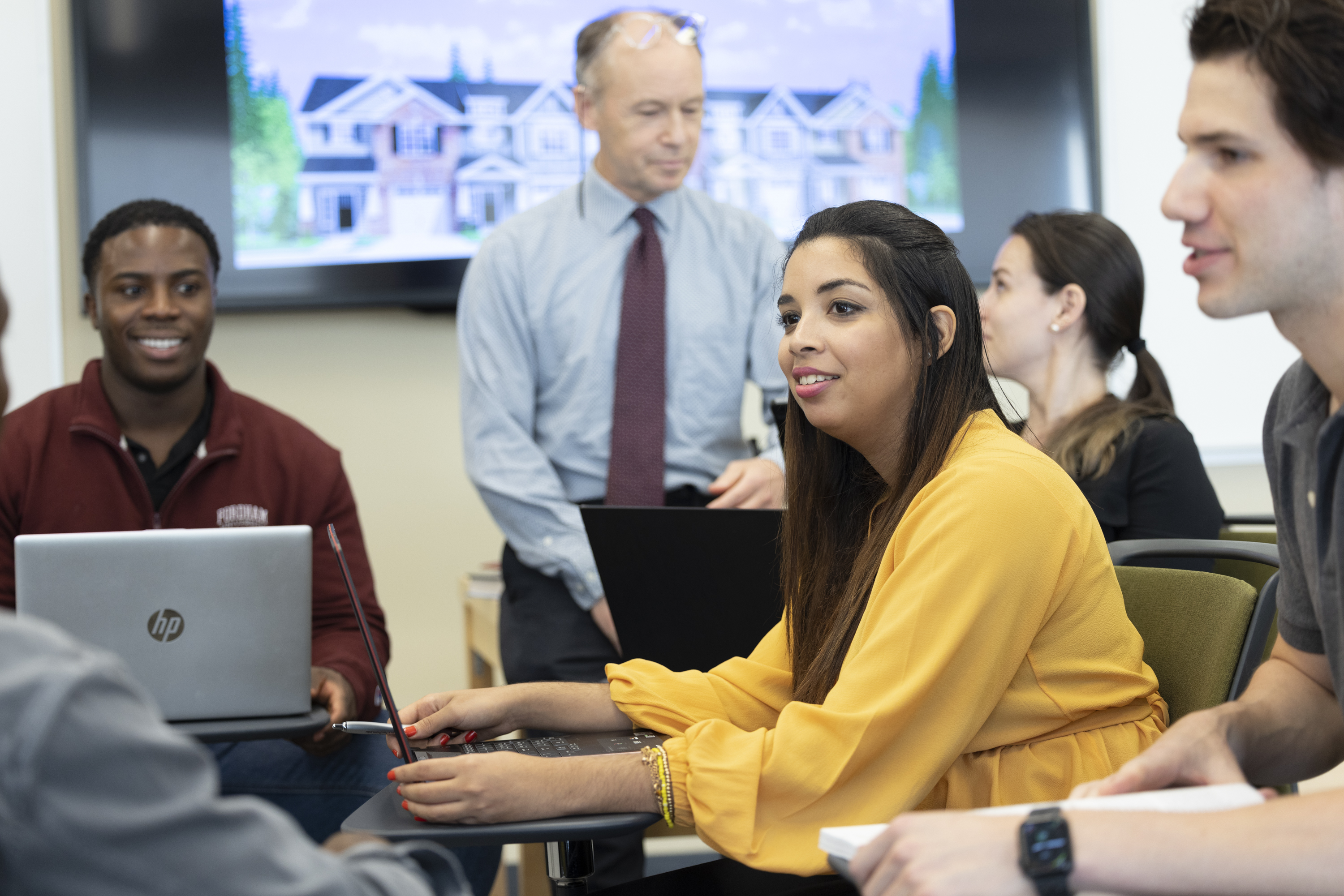 Professor and students in classroom