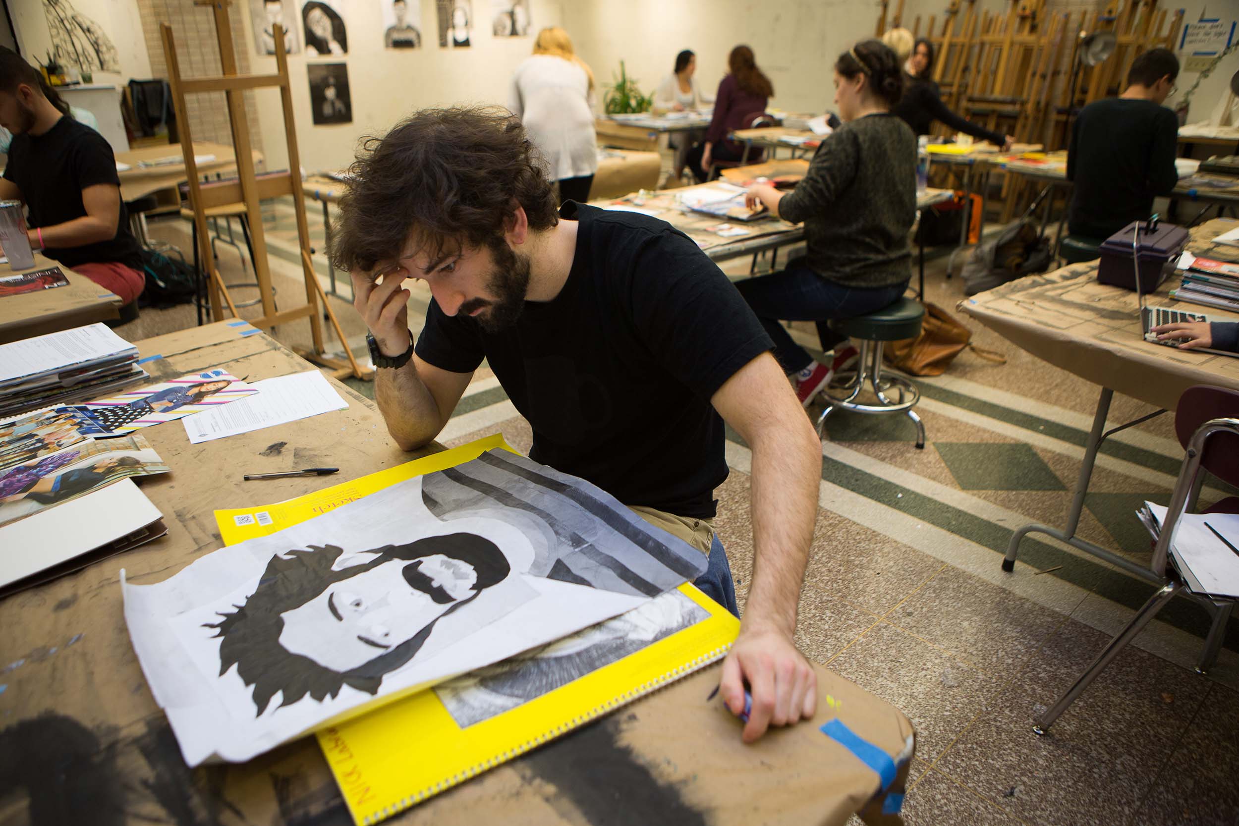 Visual Arts Student with Drawing