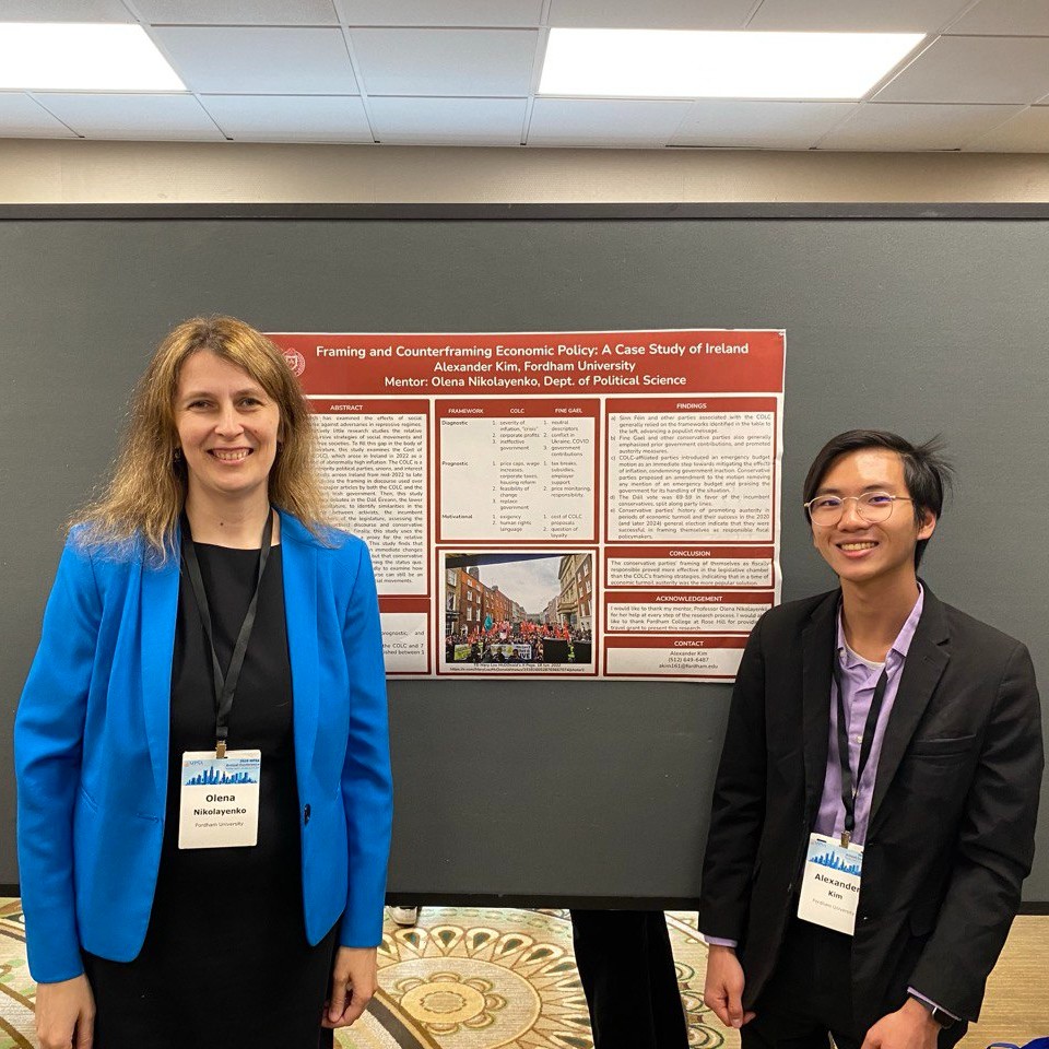 Alexander Kim with Director Olena showcasing research