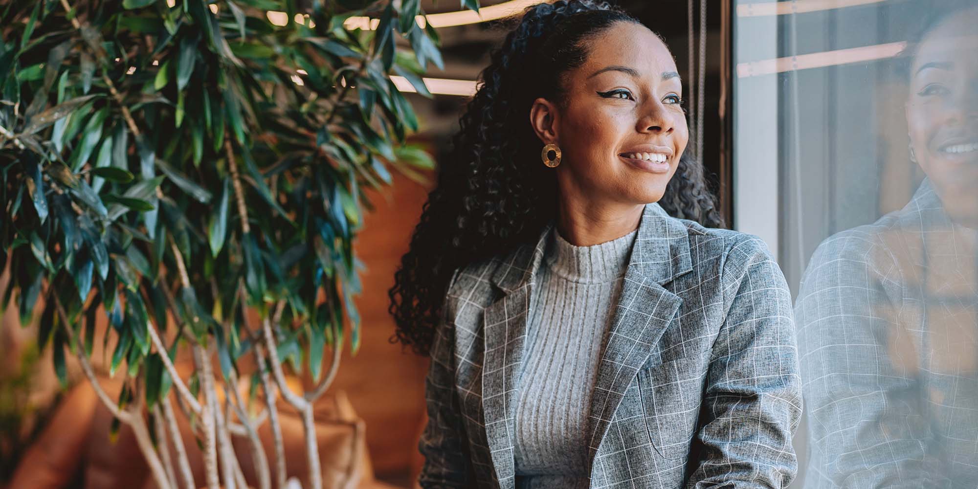 Executive Looking Out Window