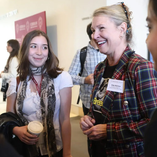 Kate speaking with students