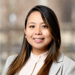 a headshot of Kristine Naputo