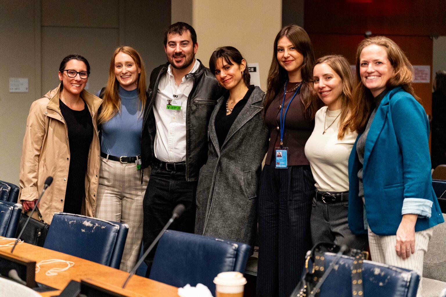 students smile for a group photo during social work day at the UN
