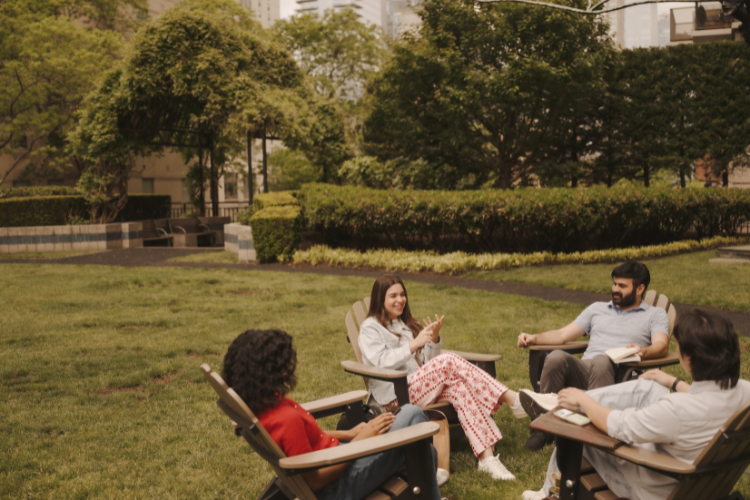 students sitting in fordham's lincoln center courtyard