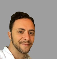 A man wearing a white shirt.